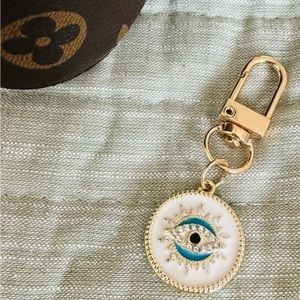 Unbranded white evil eye bag charm with rhinestones